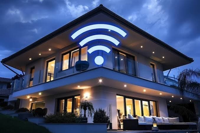 Modern smart home at twilight with glowing Wi-Fi signal beacon representing high-speed internet streaming bandwidth
